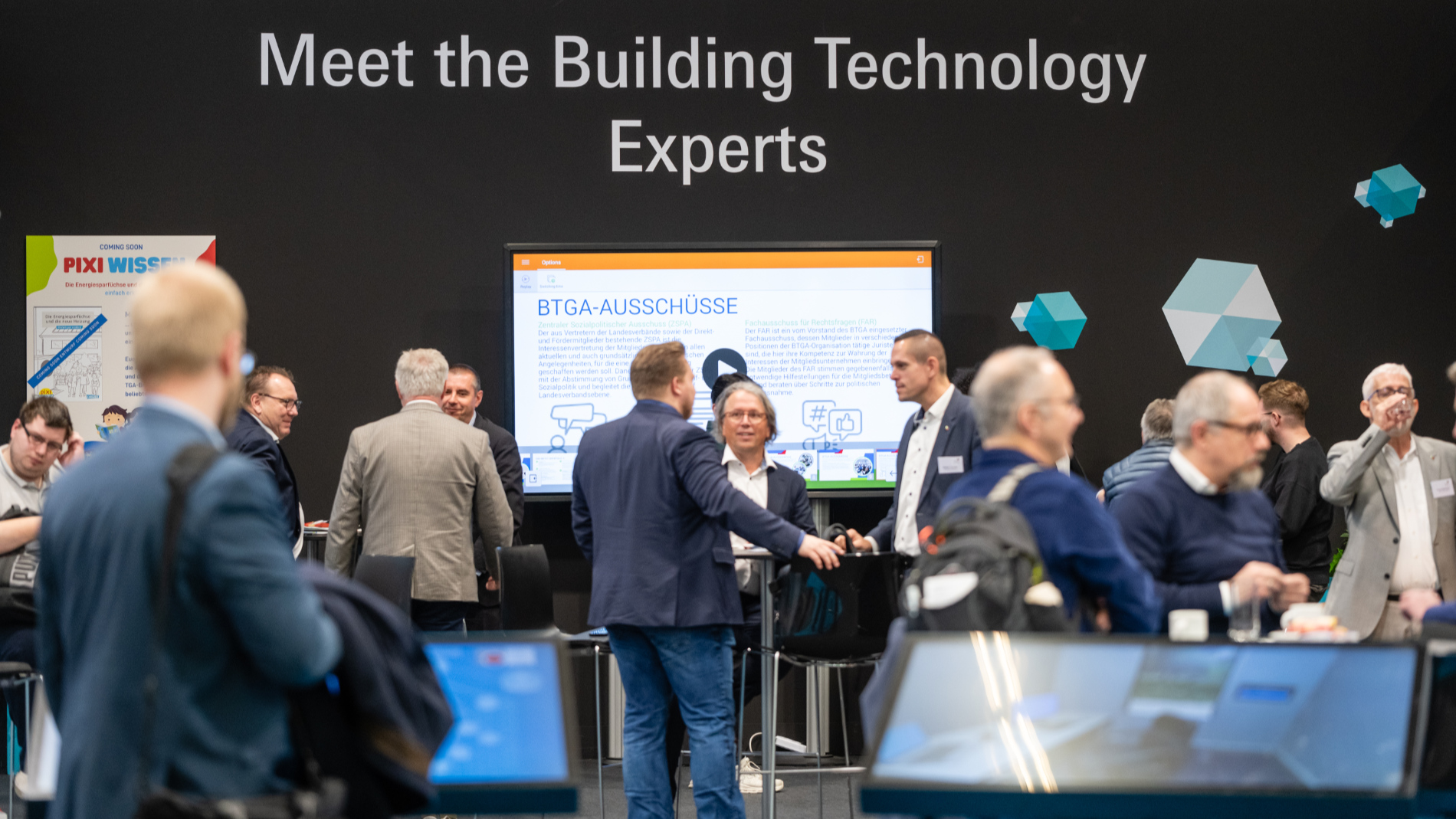 ISH trade fair visitors in an exhibition hall